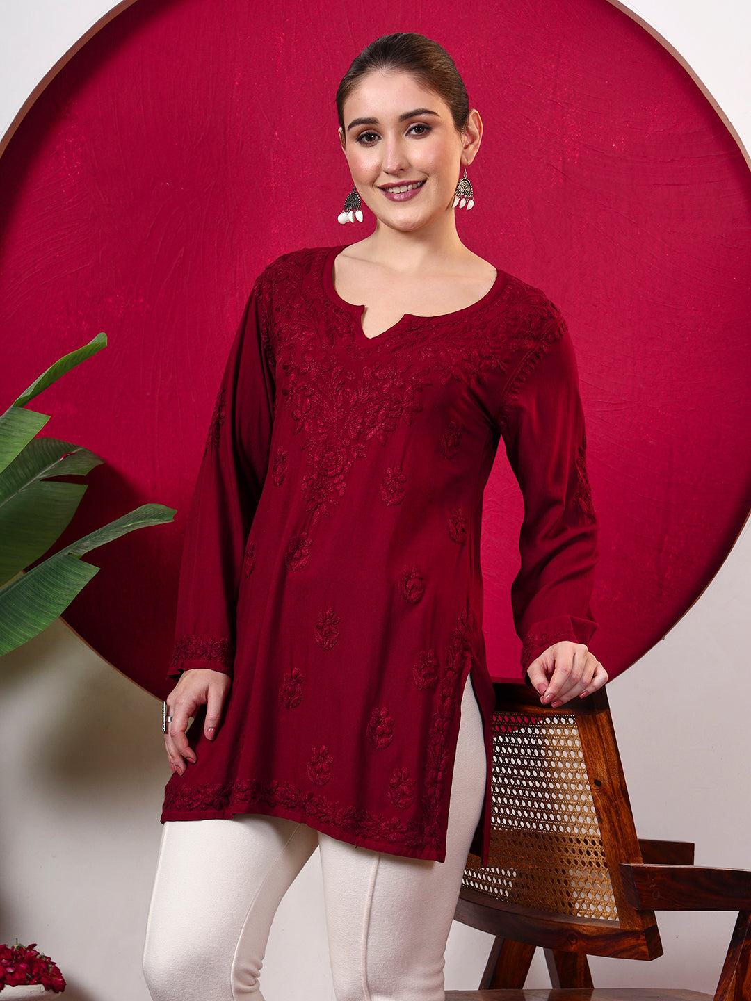 Close front view of the Shruti Rayon Short Kurti highlighting detailed Chikankari embroidery around the neckline, chest, sleeves and lower hem with a relaxed everyday fit.