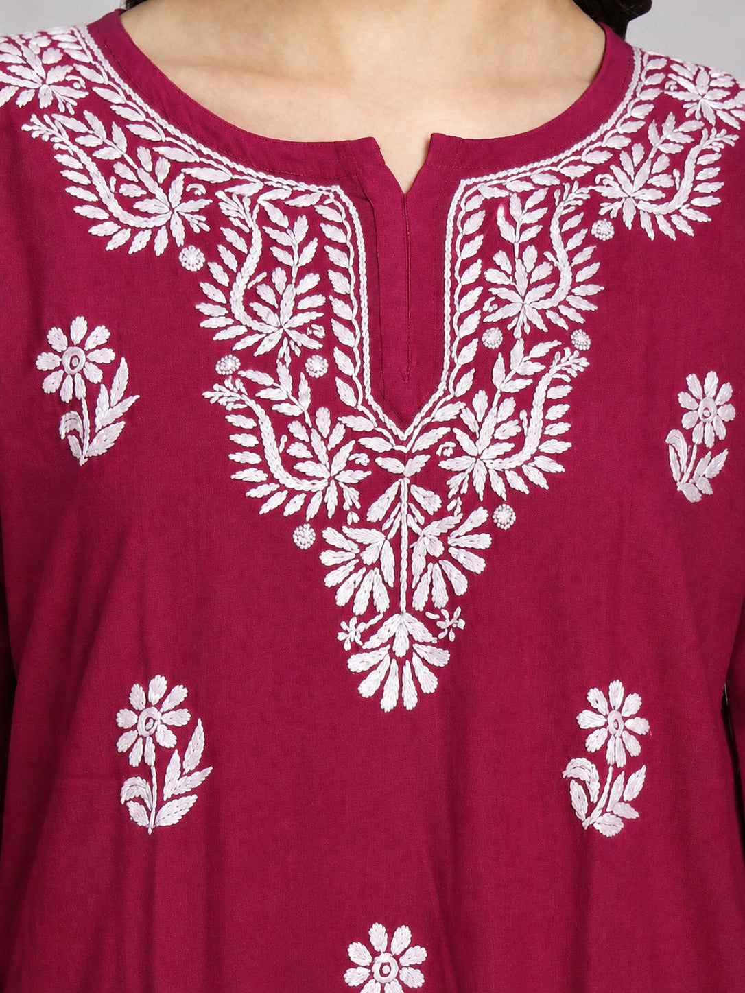 Sirat Rayon Short Top for office and college wear featuring elegant Chikankari embroidery, comfortable 3/4 sleeves and a contemporary short kurti silhouette.