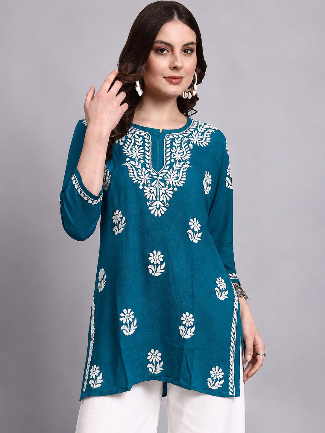 Sirat Rayon Short Top with handcrafted-inspired Chikankari embroidery and floral motifs, designed for women seeking stylish and comfortable daily ethnic wear.