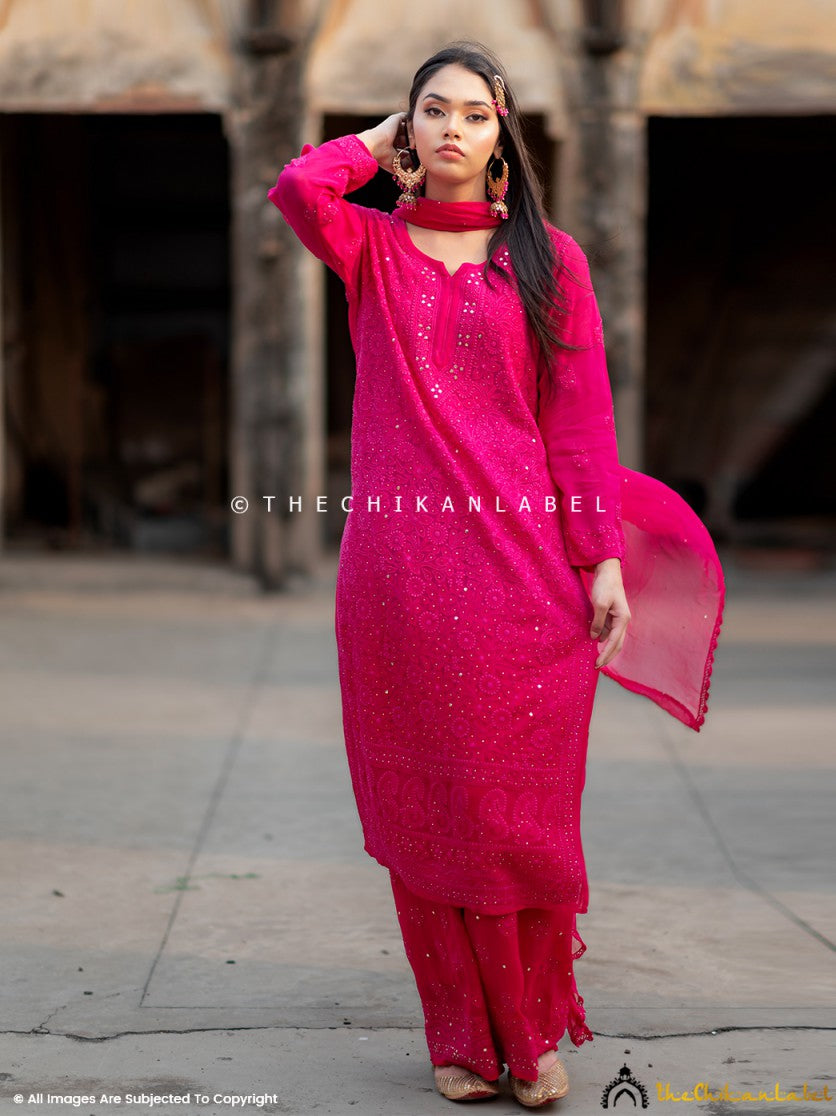 Trending viscose chikankari set with detailed hand embroidery and shimmer mukaish highlights for a wedding-ready look.