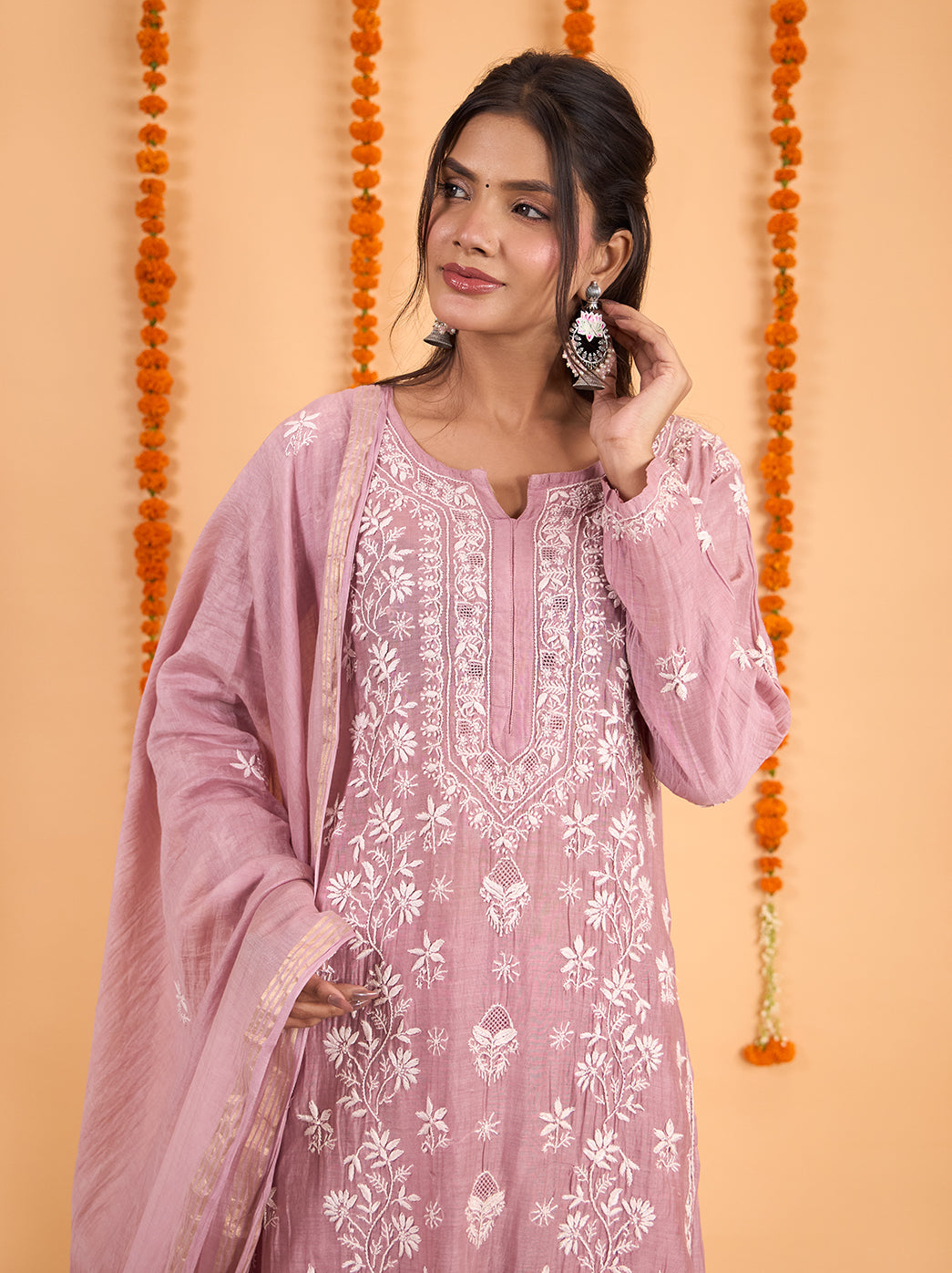 Sofia Mul Chanderi ethnic outfit featuring a straight embroidered kurta, coordinated wide-leg bottoms and a dupatta with floral motifs and a narrow decorative border.
