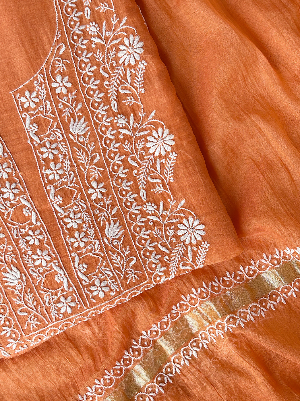Premium unstitched mul chanderi chikankari kurti fabric featuring detailed neck embroidery and dupatta for custom ethnic designs