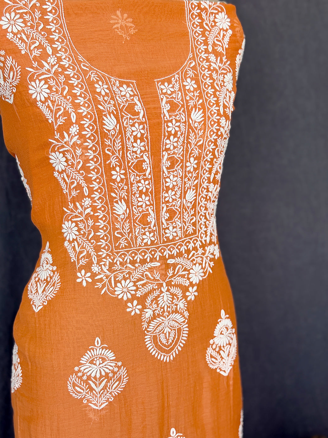 Elegant unstitched chikankari mul chanderi kurti piece with intricate embroidery panel and matching dupatta for festive occasions