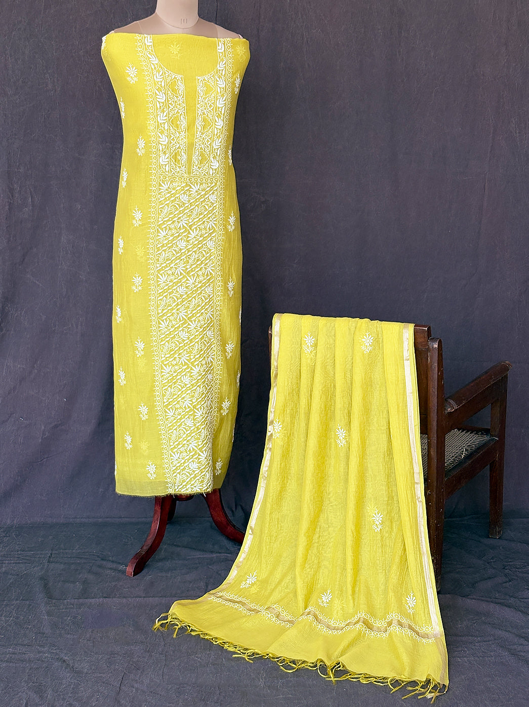 Elegant unstitched mul chanderi chikankari kurti set with delicately embroidered neckline design and soft textured dupatta for festive and daily wear