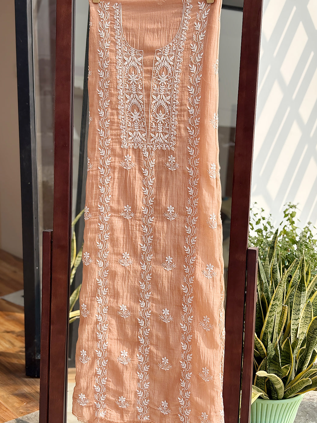 High-resolution image showcasing Mul Chanderi unstitched kurti fabric with premium handcrafted Chikankari motifs.