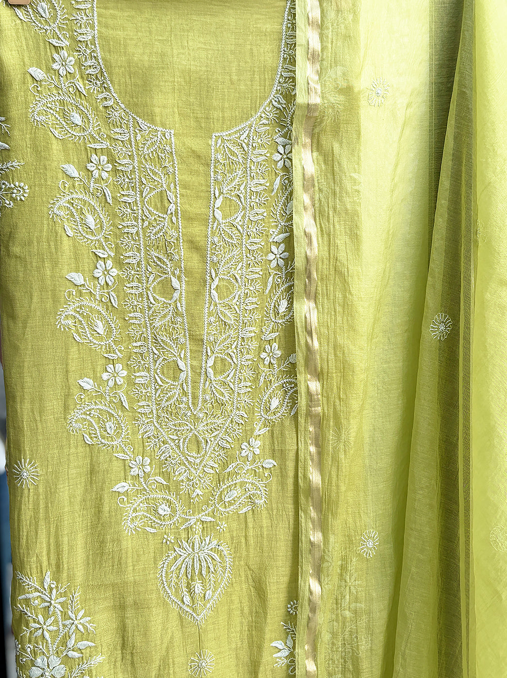 Unstitched chikankari kurti piece with ornate embroidery suitable for festive and cultural occasions