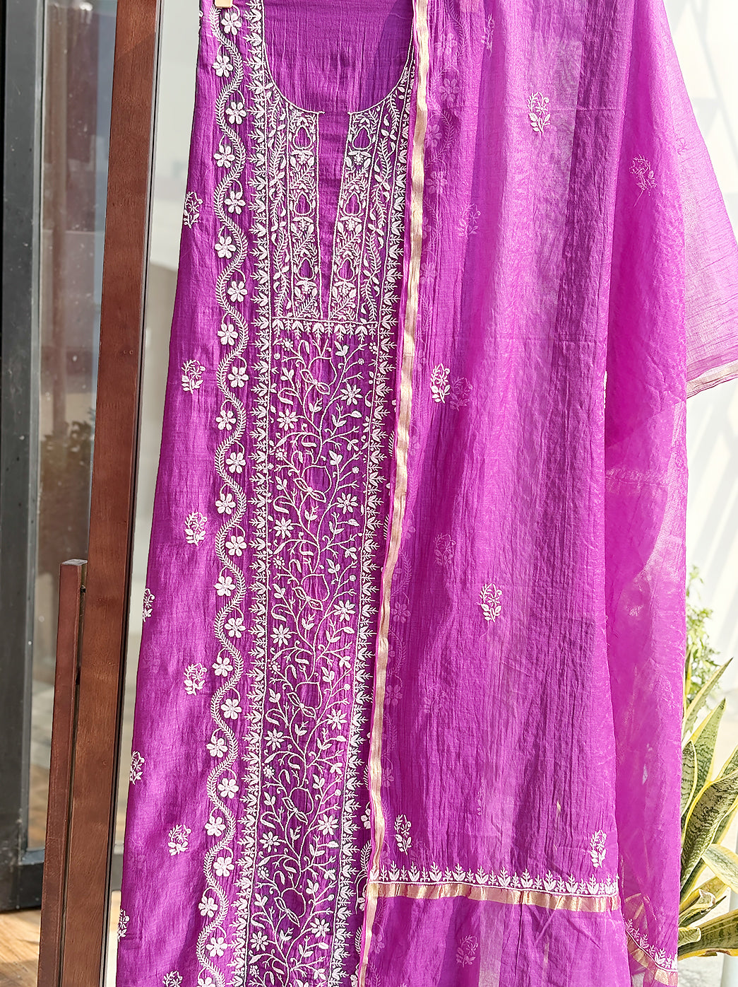 Flatlay image of Mul Chanderi kurti piece with dupatta emphasizing delicate hand embroidery suitable for custom tailoring.