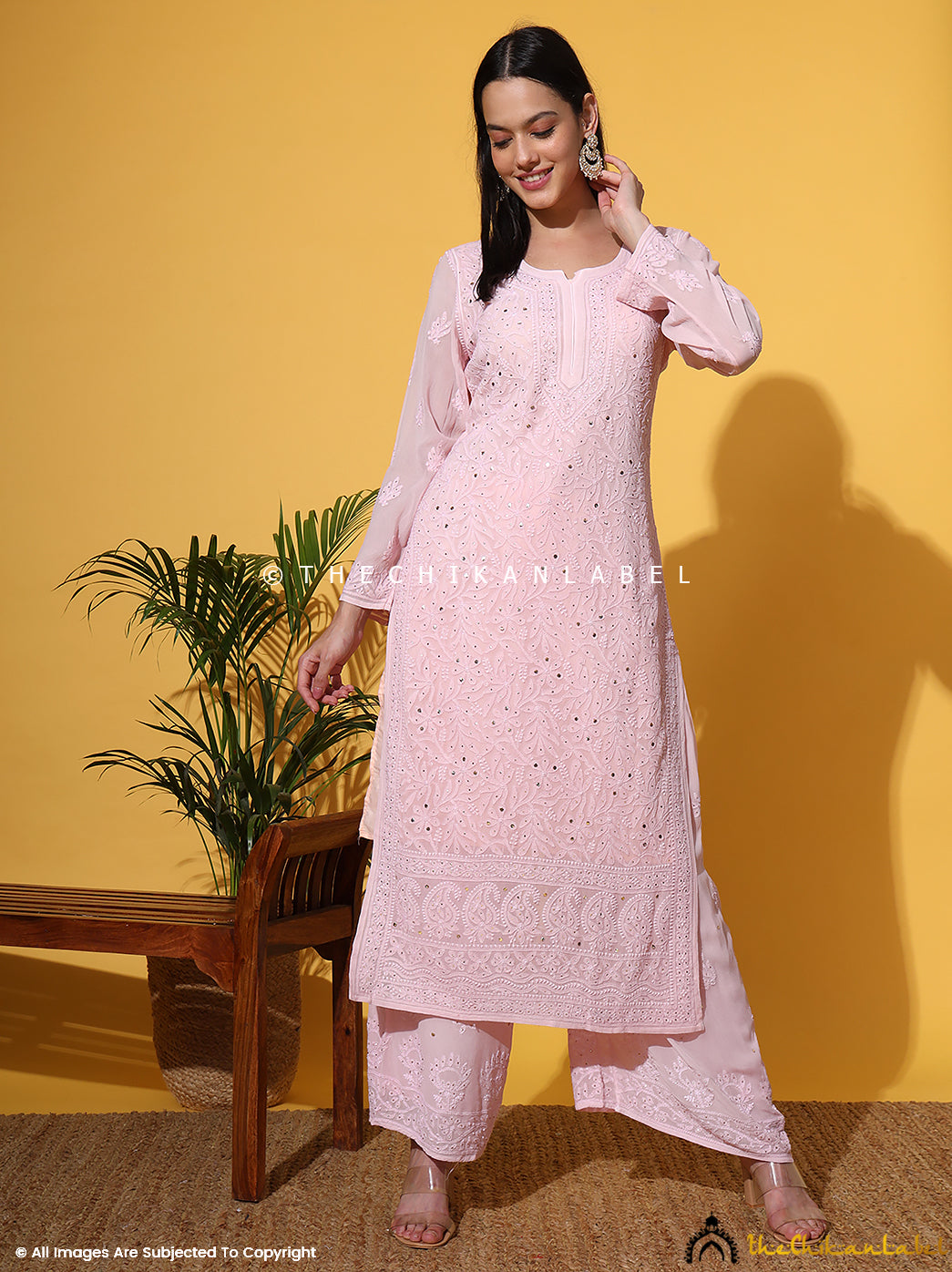 Model showcasing a viral chikankari set in soft viscose fabric with handcrafted embroidery and festive-ready silhouette.
