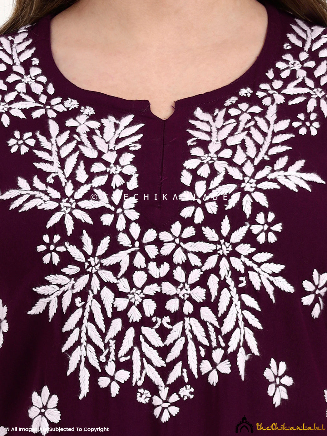 Versatile modal short top with intricate chikankari work for ethnic and Indo-western looks.