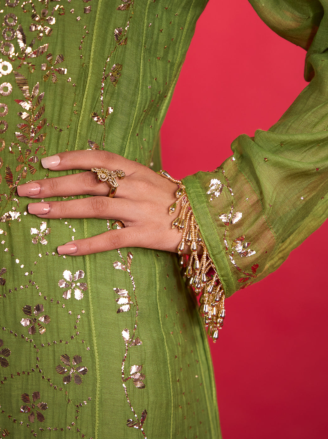 Full-length view of the Tehzeeb Mul Chanderi Kurta Set with Dupatta, showing embellished sleeve cuffs, a decorative hem and coordinating bottoms with scalloped edges.