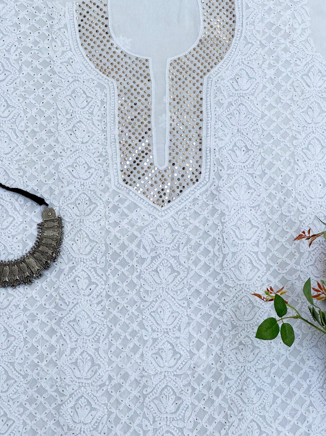 Viscose fabric unstitched kurti piece paired with dupatta designed with mukaish work for traditional celebrations.