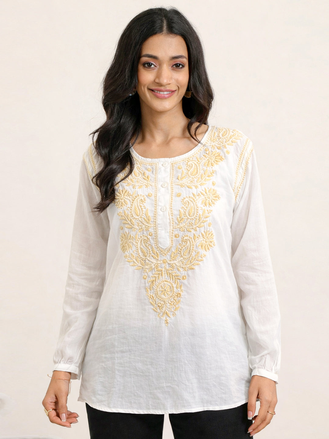 Designer chikankari kurti top with handcrafted embroidery work inspired by Lucknowi artisans, offering timeless elegance and everyday comfort.