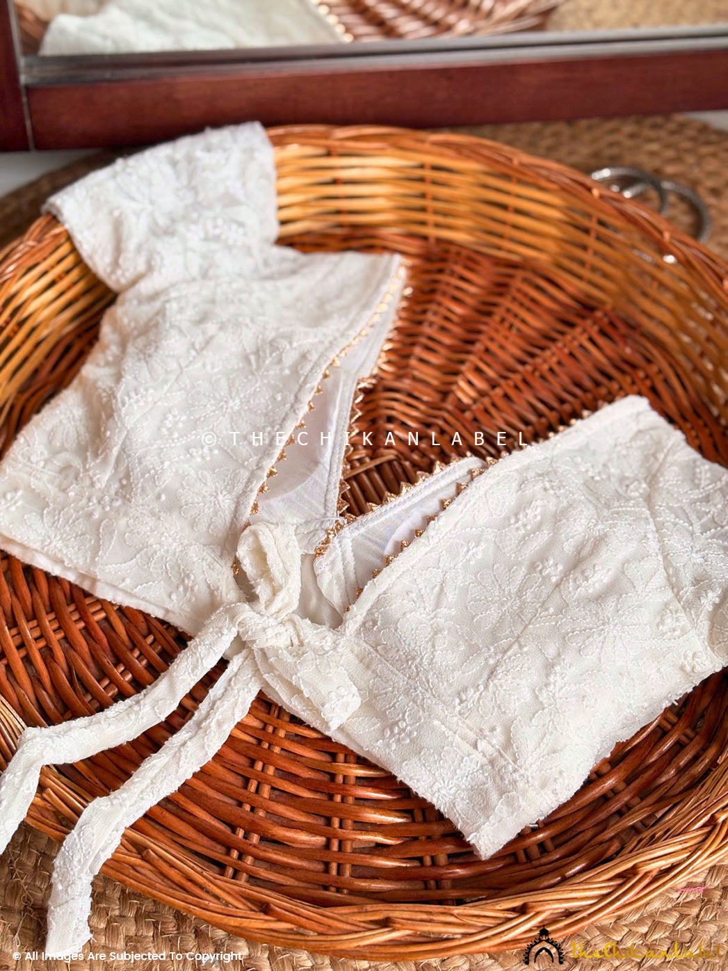 Stylish and minimalistic Chikankari blouse worn with ethnic bottoms showcasing timeless embroidery