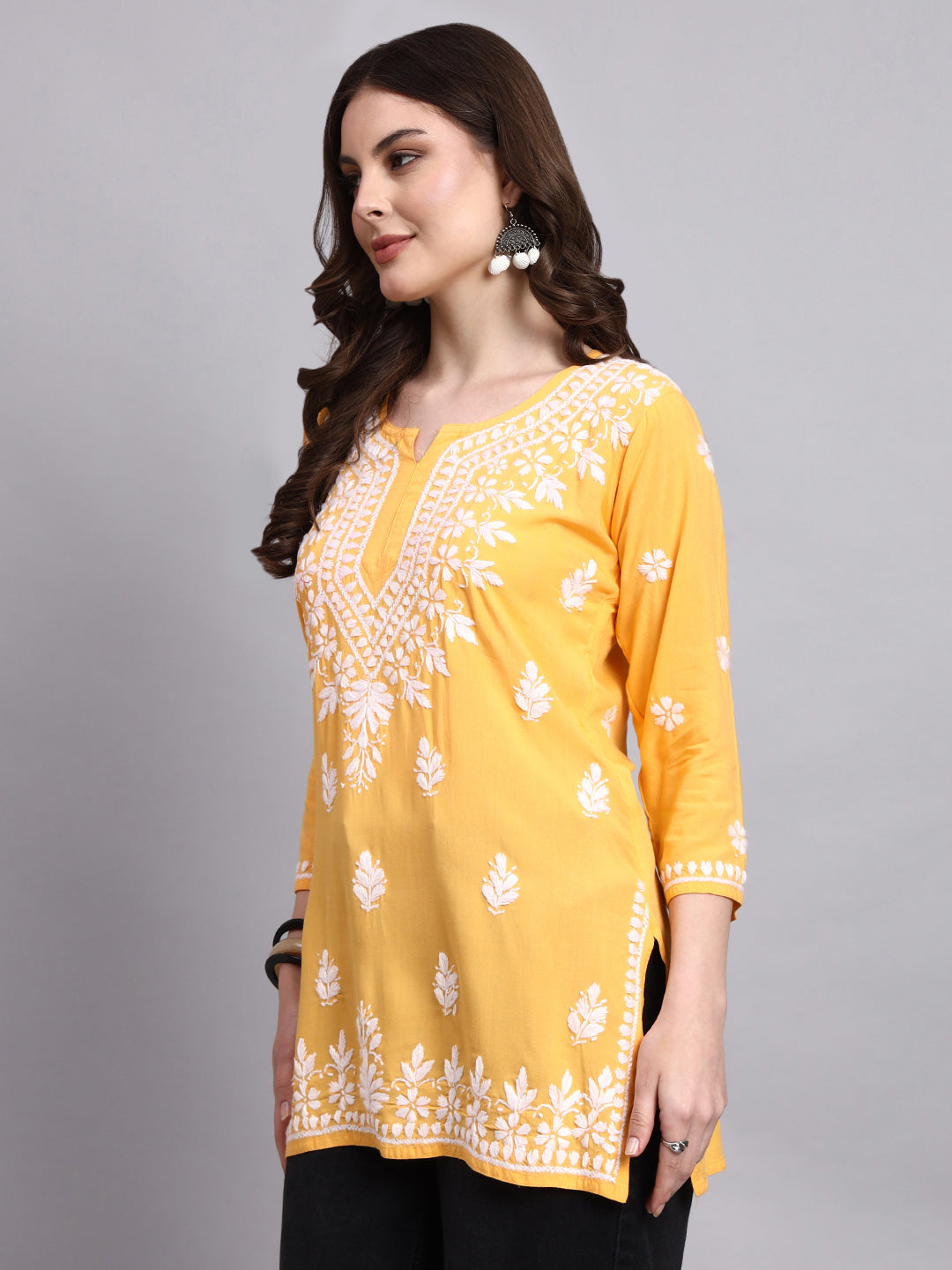 Women’s rayon short kurta with subtle chikankari embroidery for refined ethnic wear