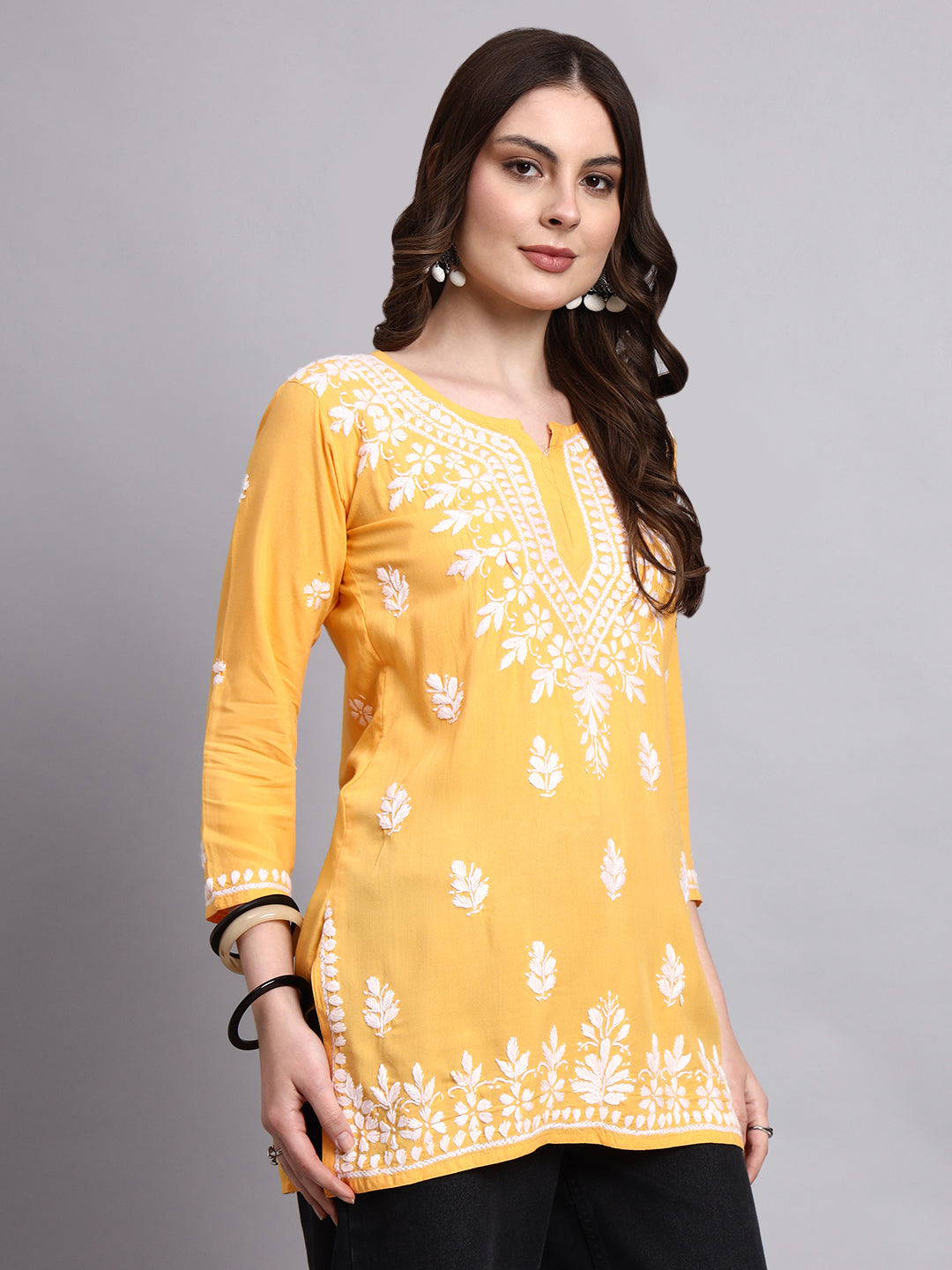 Handcrafted chikankari short kurta designed as a versatile ethnic and fusion wardrobe essential