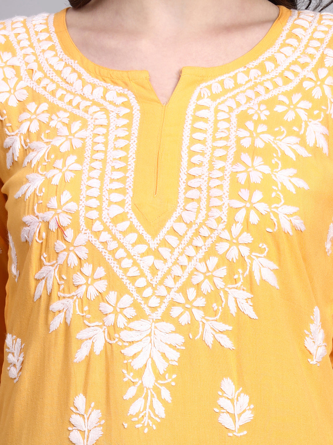 Handmade chikankari short kurta showcasing traditional embroidery techniques on premium rayon fabric