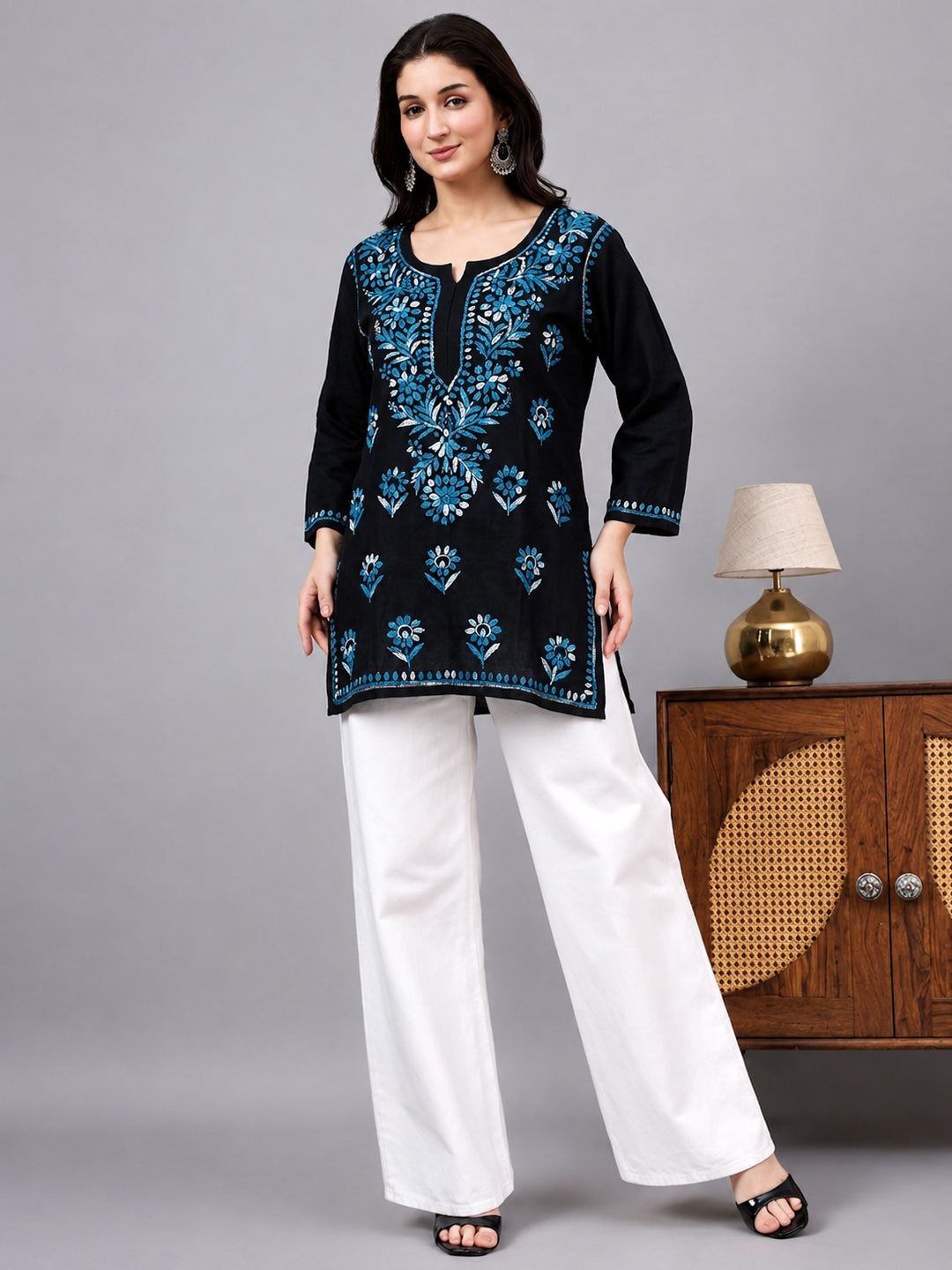 Handcrafted Chikankari top with traditional floral threadwork, comfortable rayon fabric, and elegant design suitable for daily wear
