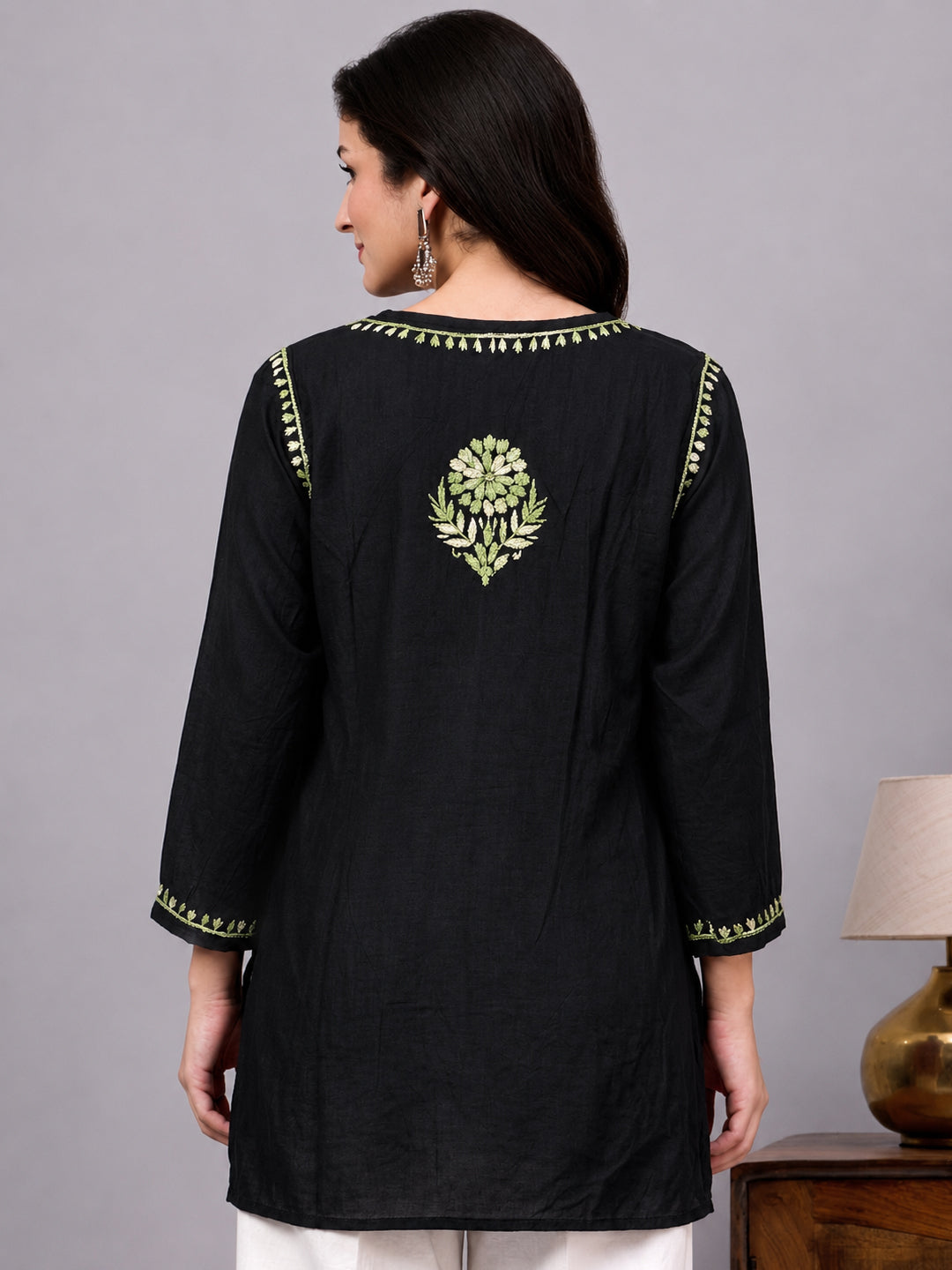 Premium rayon Chikankari short kurta designed with traditional embroidery patterns, lightweight fabric, and modern ethnic fashion styling