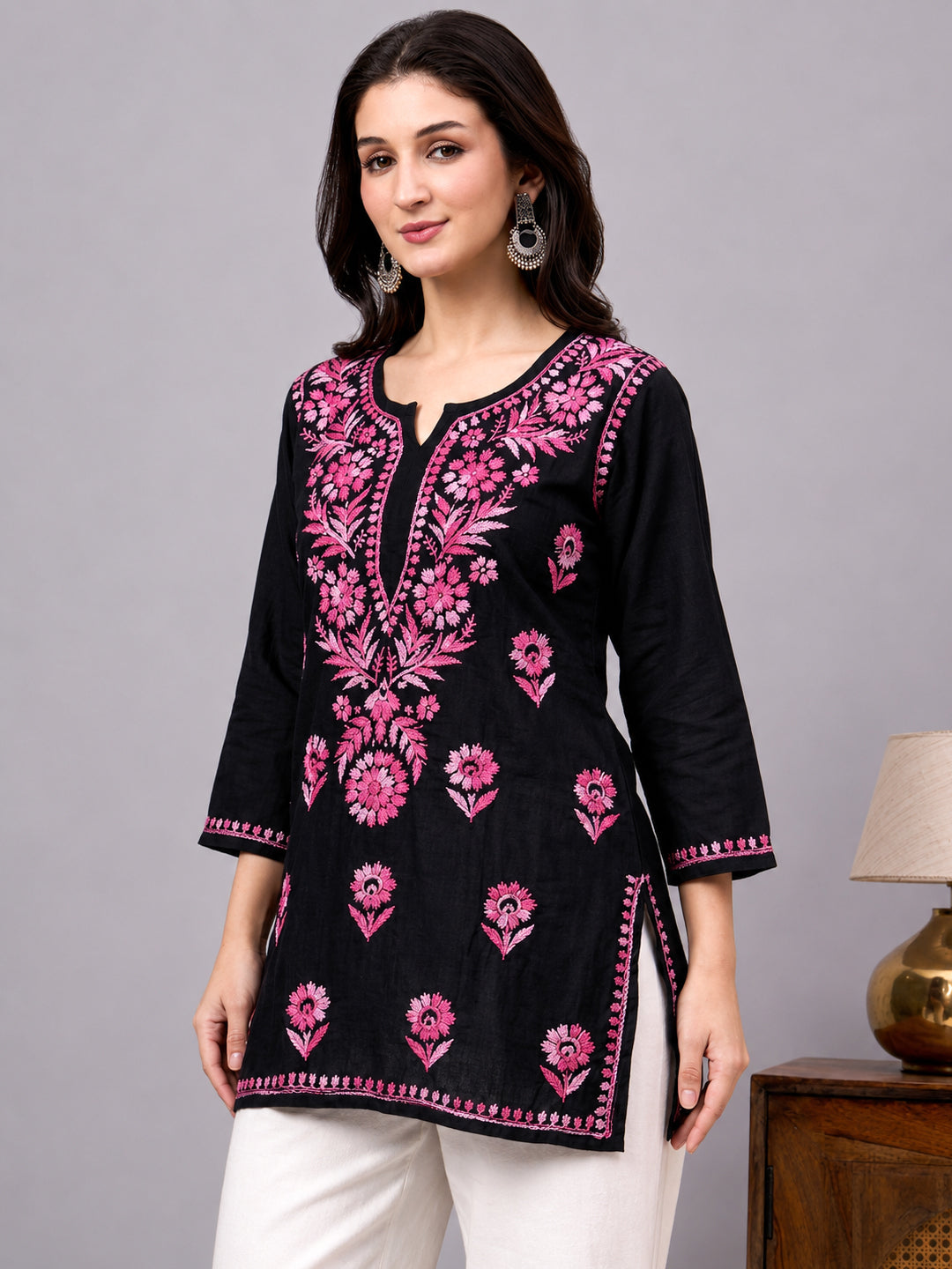 Premium rayon Chikankari short kurta designed with traditional embroidery patterns, lightweight fabric, and modern ethnic fashion styling