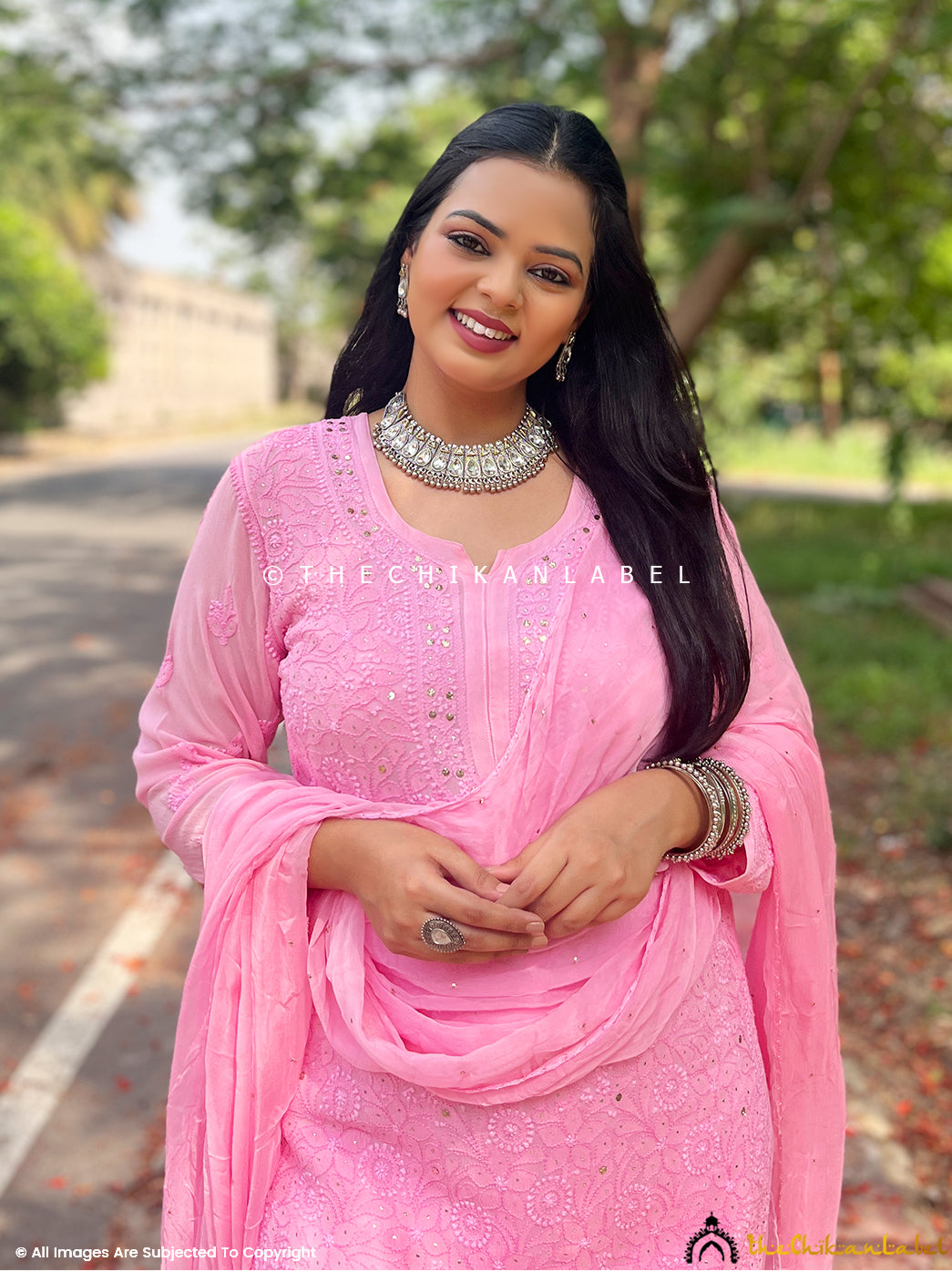 Straight-fit pink kurta with white hand embroidery details