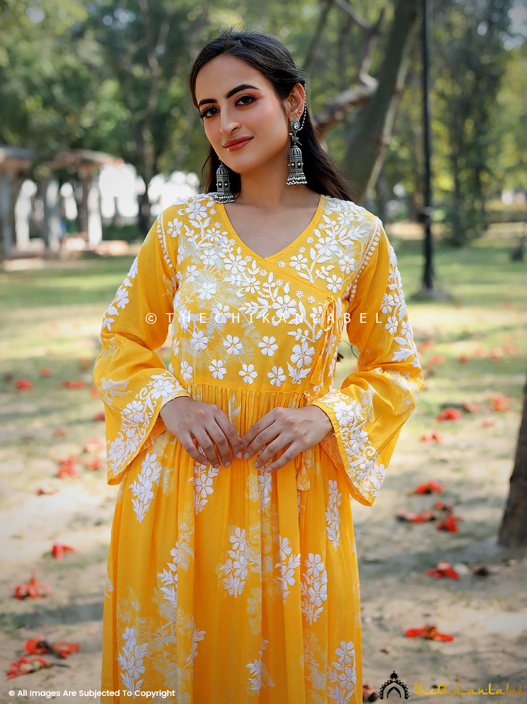 Biba yellow mulmul cotton kurti with hand embroidery in floral motifs