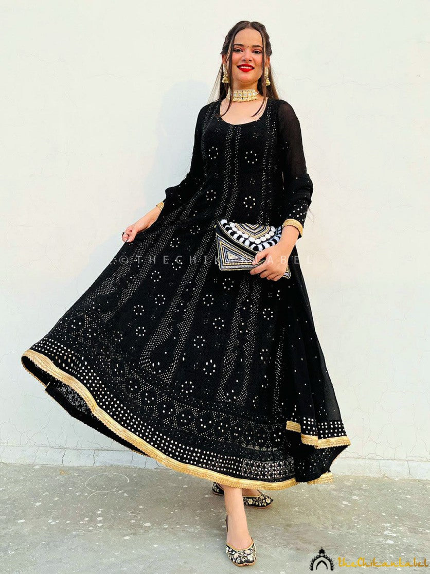Heavy embroidered chikankari Anarkali styled with bridal jewelry and ethnic makeup for wedding inspiration