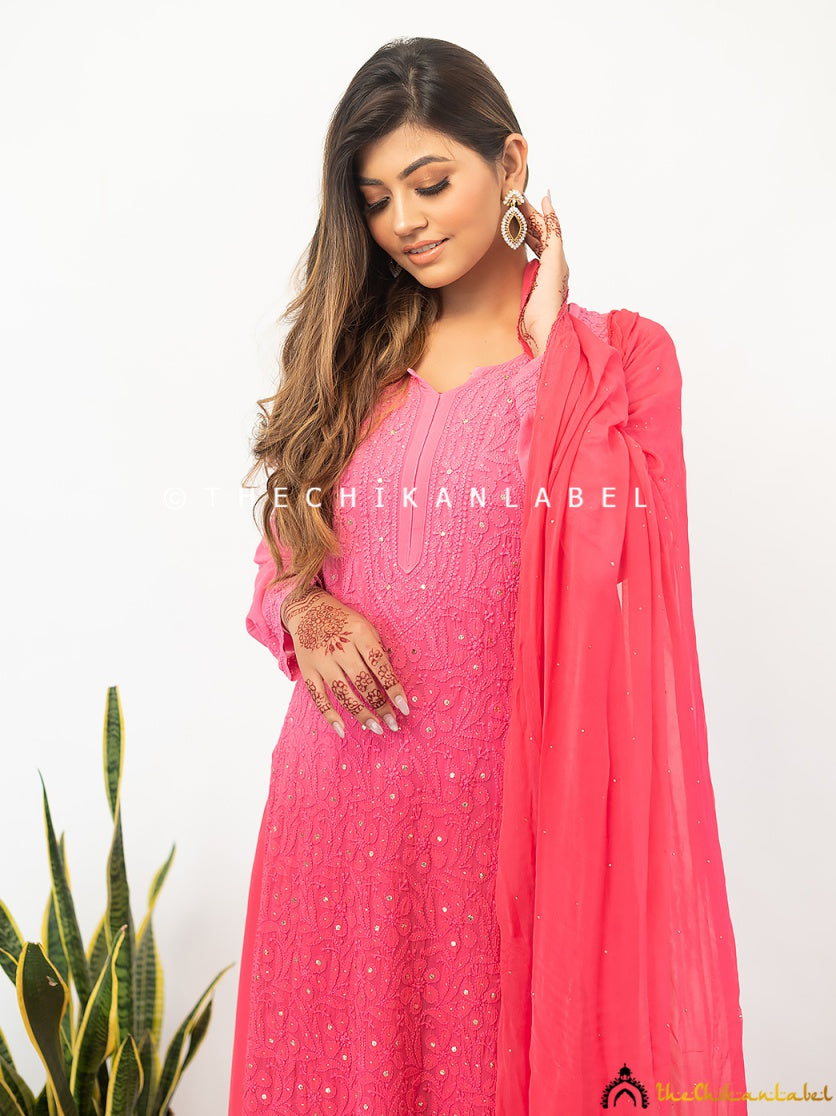 Trending wedding wear featuring a soft viscose chikankari kurti palazzo and shimmer dupatta ensemble.