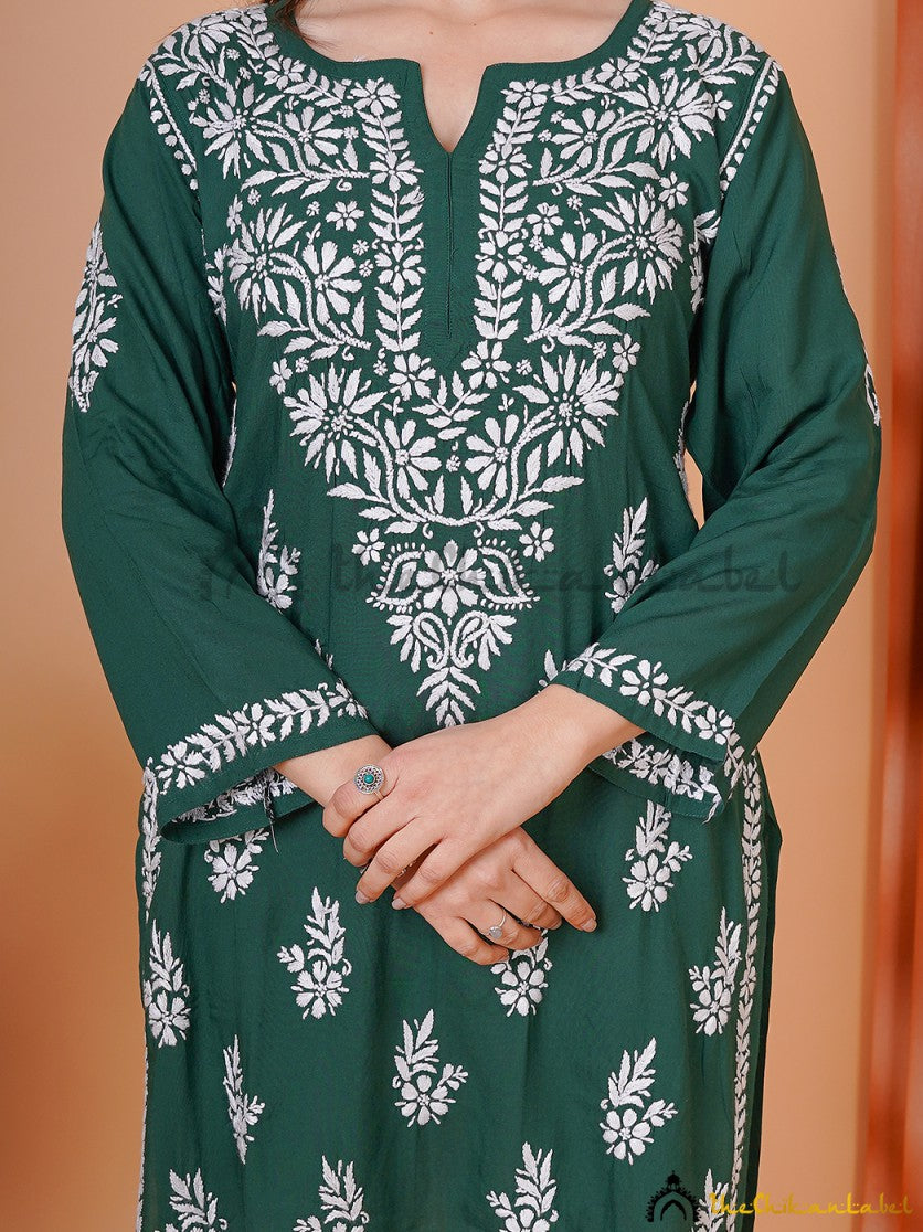 Aiza green chikankari tunic with full sleeves and notched neckline, styled for a modern ethnic look.