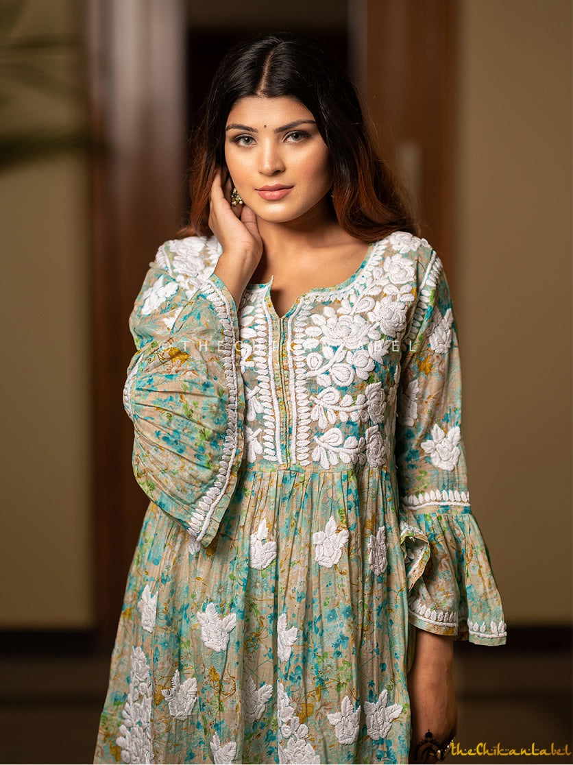 Traditional Lucknowi embroidery on green peplum silhouette