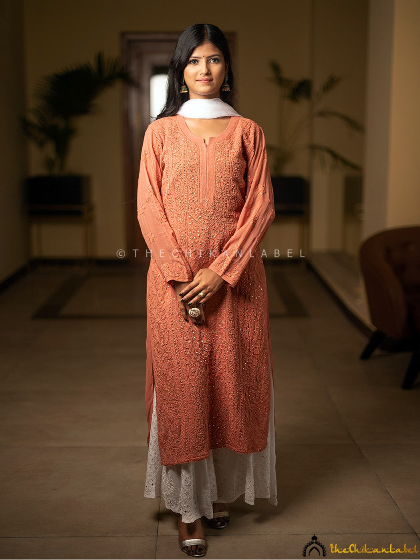 Full-length view of latte straight-cut kurti styled with silver earrings and juttis