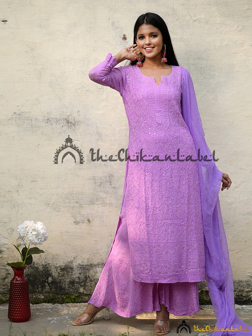 Woman wearing lilac chikankari viscose kurta set with dupatta