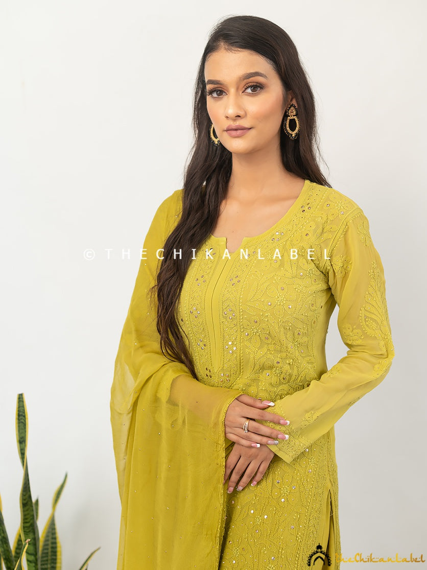 Close view of mukaish dots on viscose dupatta paired with hand-embroidered chikankari kurti and palazzo set.