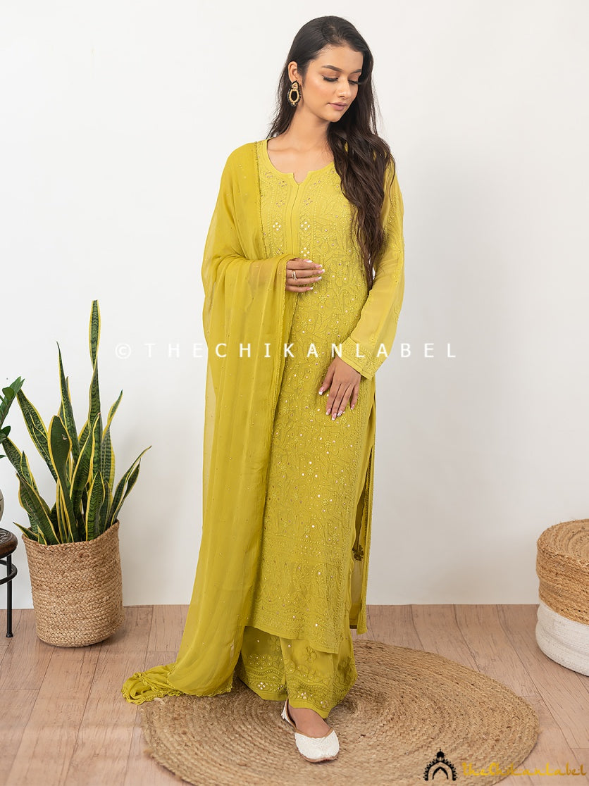 Lightweight viscose ethnic set with floral chikankari threadwork and shimmering mukaish dots throughout the kurti and dupatta.
