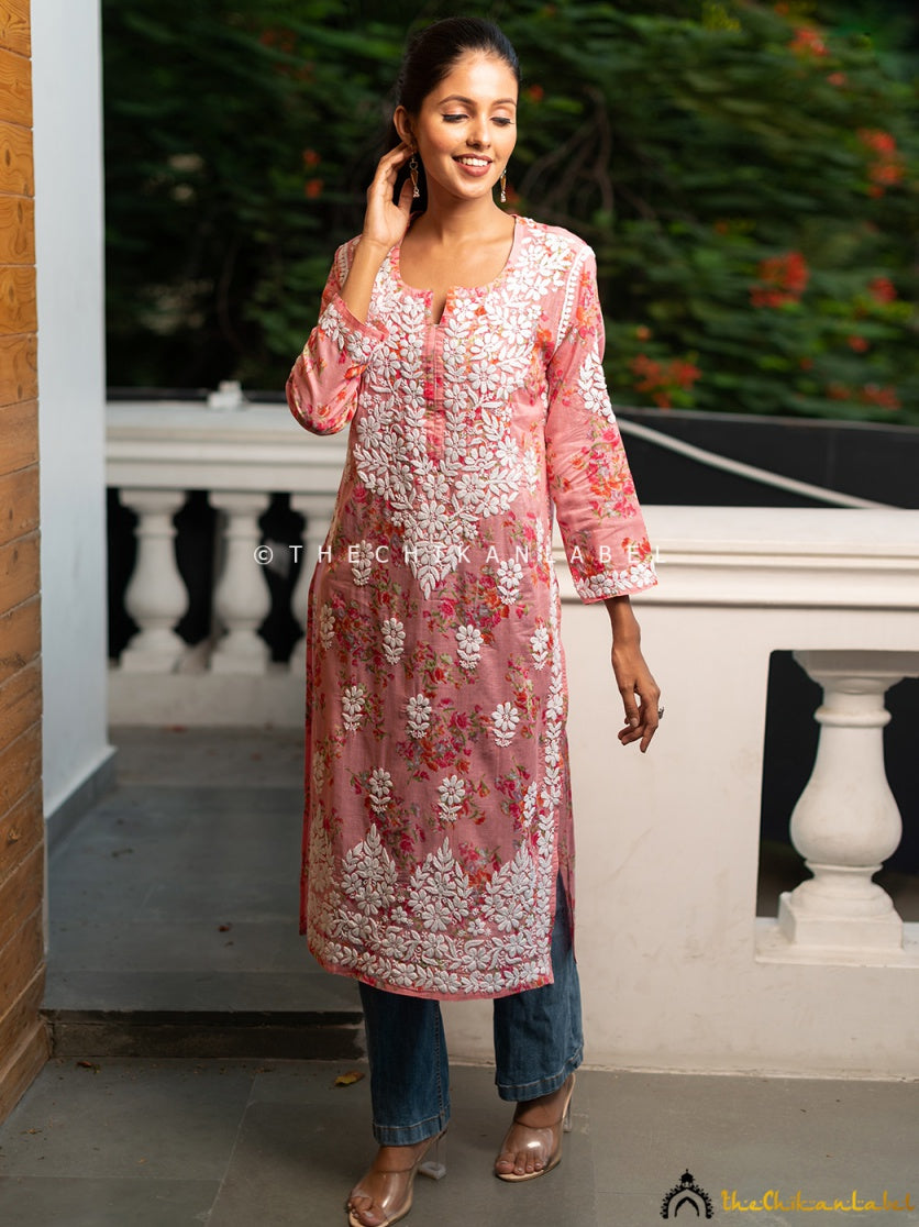 Crafted from lightweight, breathable mulmul ideal for summer wear.