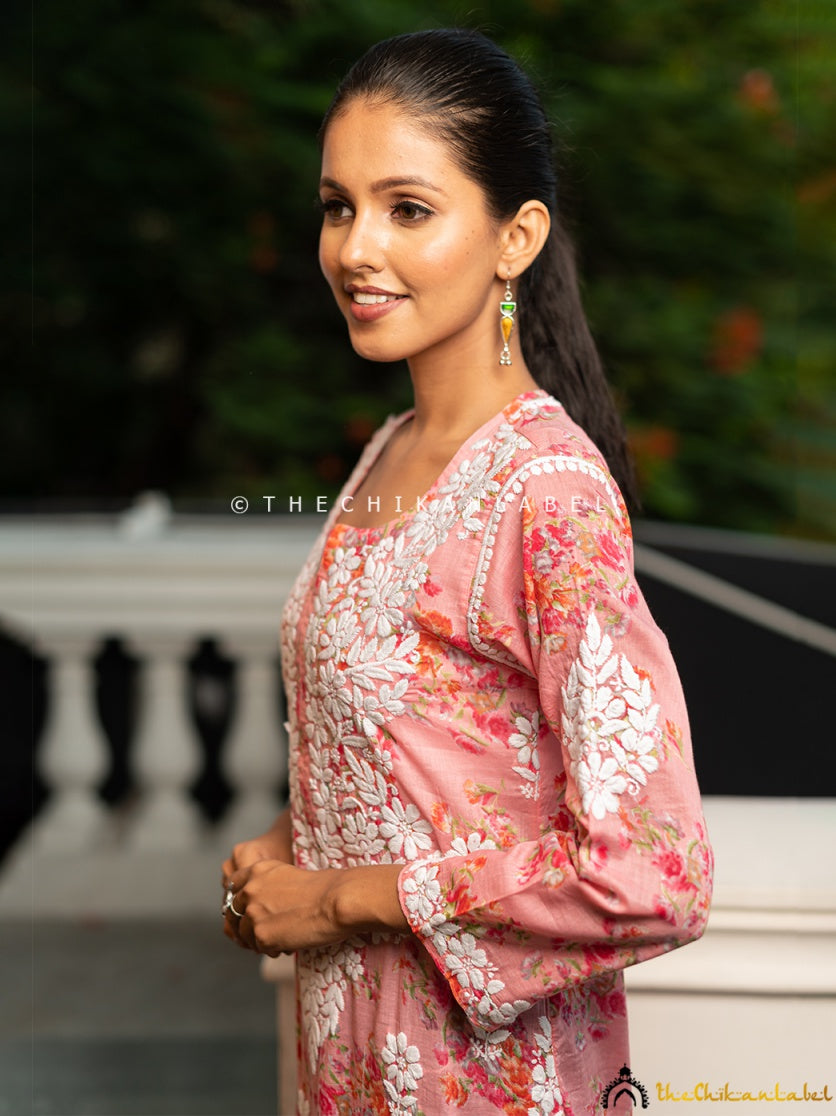 White floral chikankari embroidery runs along the front and hemline.
