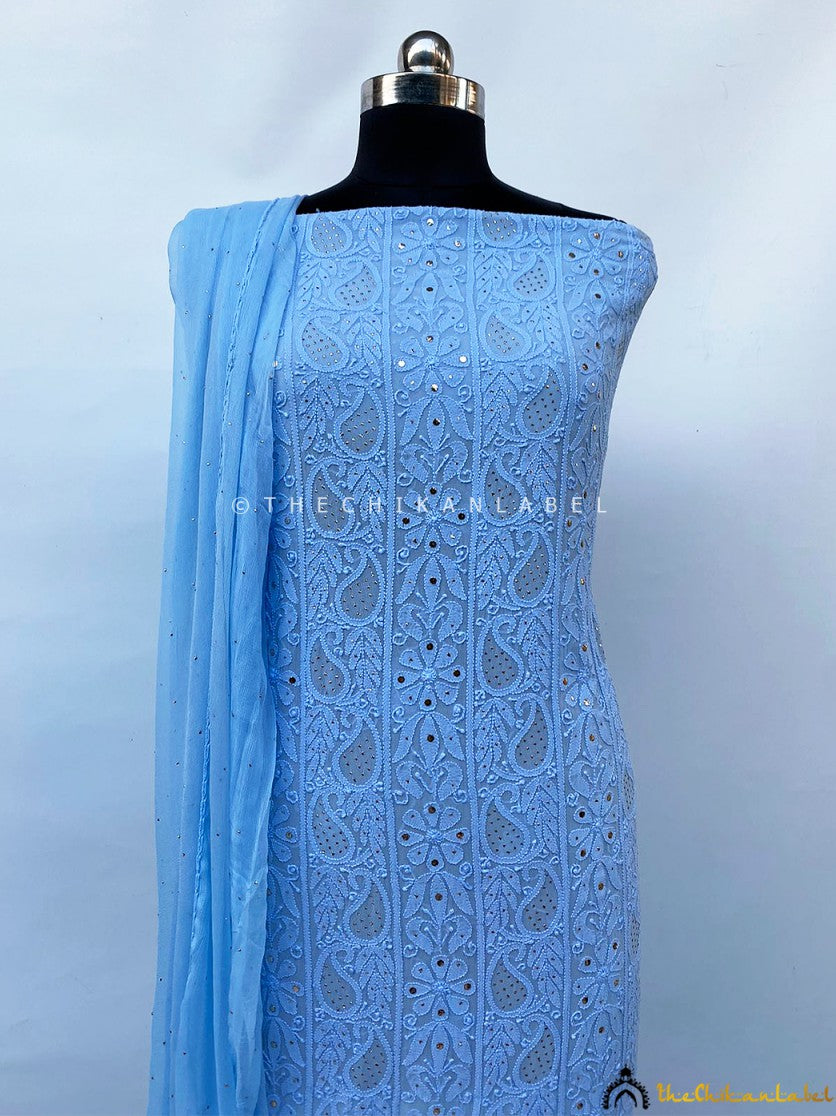 Close-up of delicate chikankari hand embroidery with mirror embellishments on viscose kurti piece with dupatta