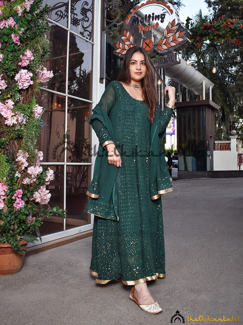 Party wear chikankari Anarkali styled with heels and statement earrings for a glam ethnic look