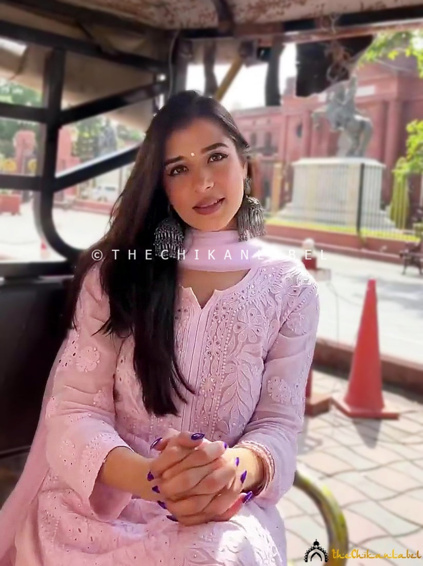 Festive-ready viscose kurti palazzo set with chikankari and mukaish highlights, perfect for daytime functions.