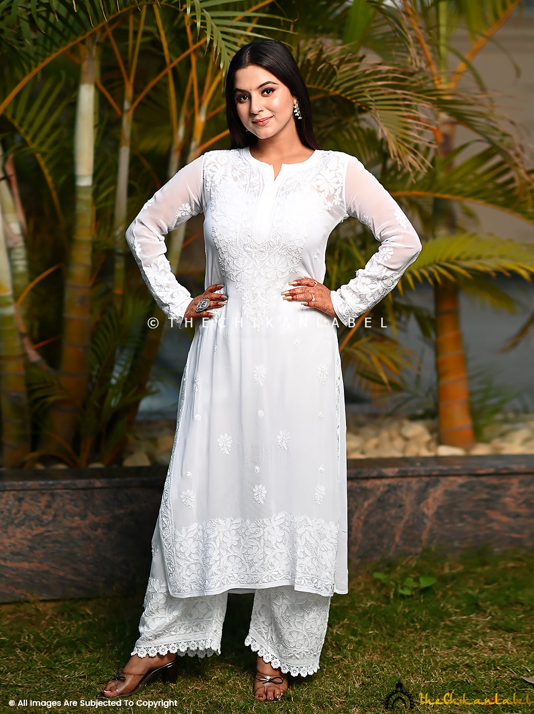 Model in elegant white chikankari ethnic outfit