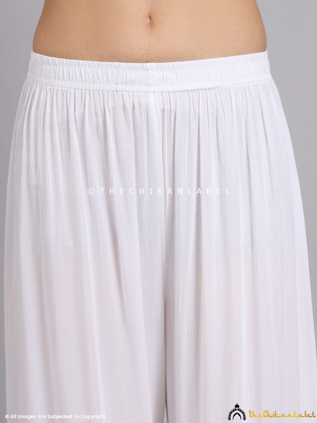 Soft modal palazzo pants styled with nude heels