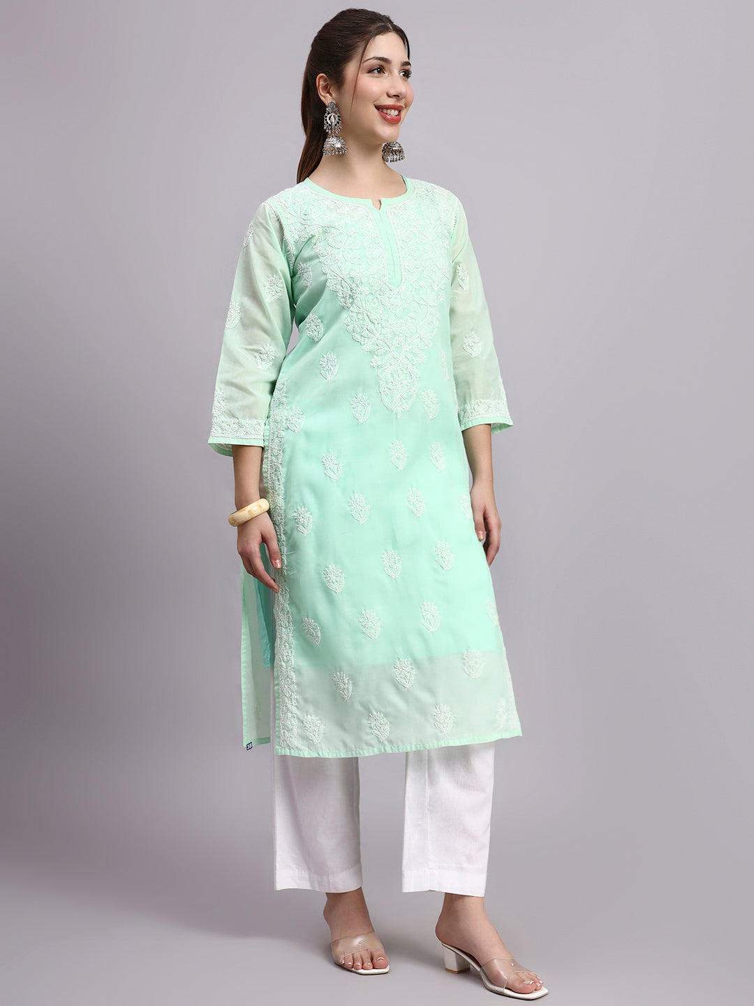 Elegant Chikankari cotton kurti with straight cut design and breathable fabric ideal for office wear and casual outings