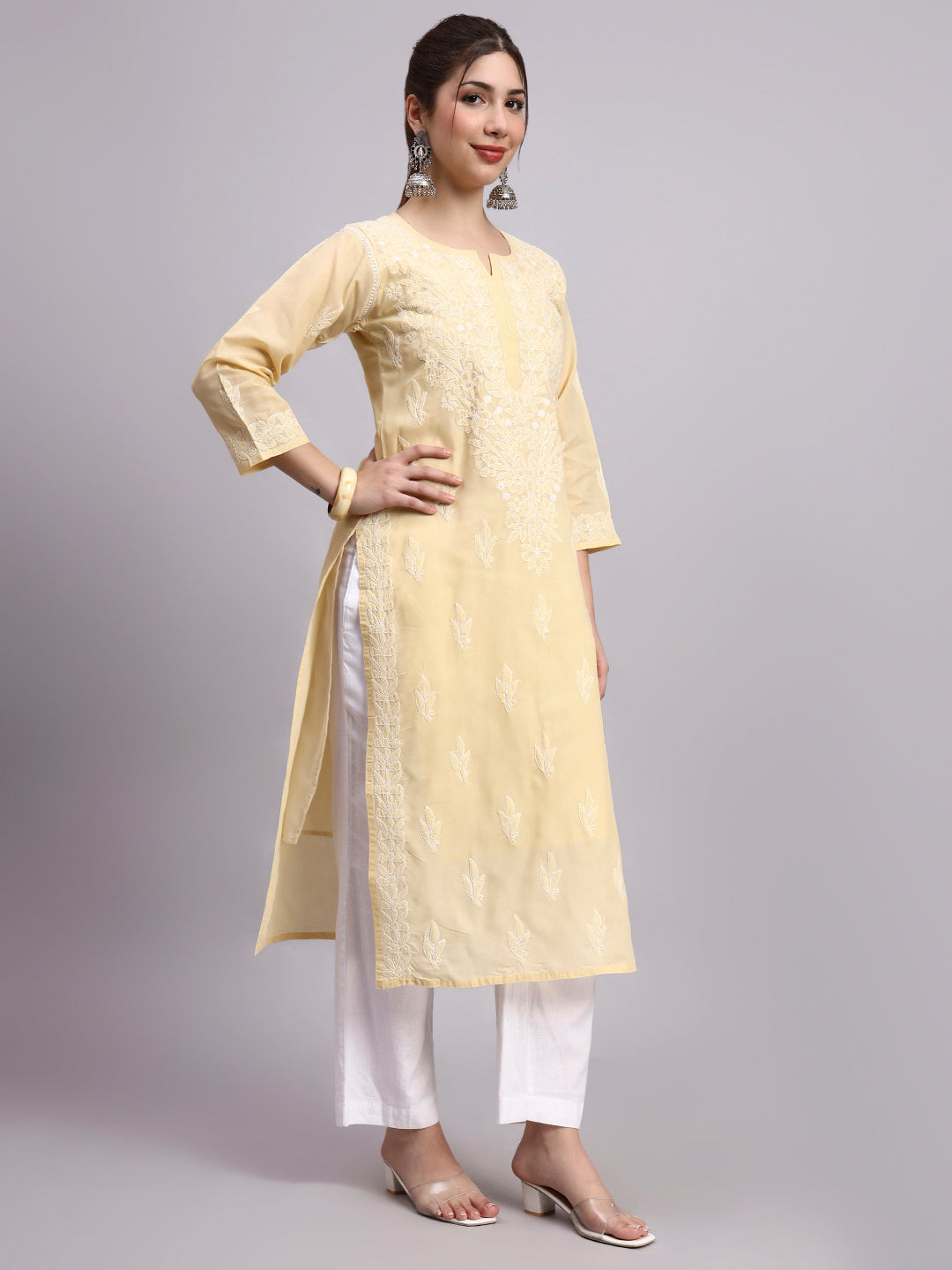 Trending women kurta with classic embroidery and straight fit design suitable for office and daily wear