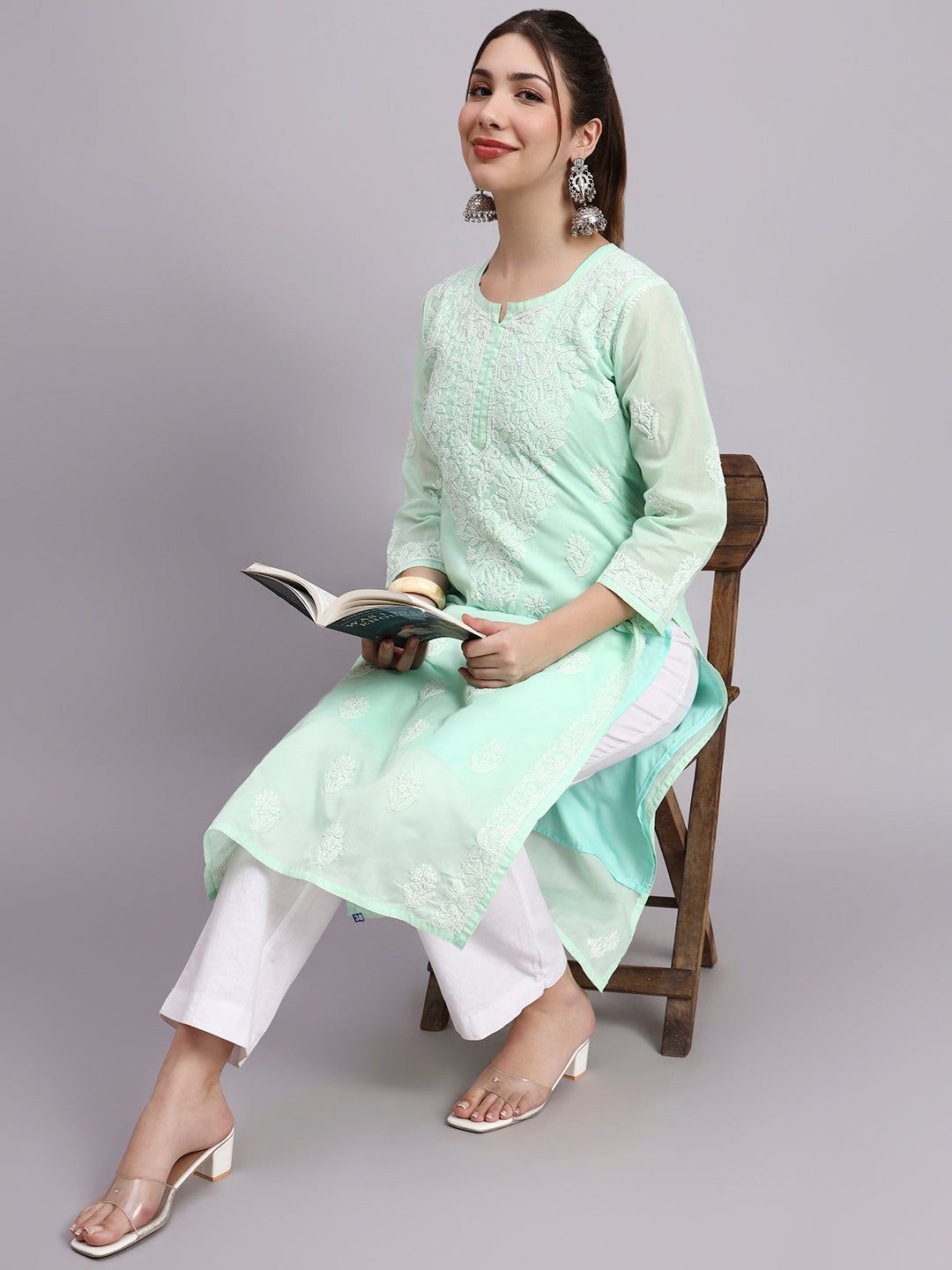 Straight fit Chikankari cotton kurti paired with pants showcasing minimal and elegant ethnic wear for women