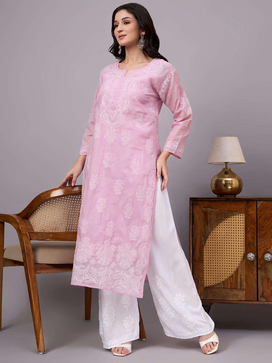 Comfortable regular wear Chikankari Kurta made from premium cotton fabric with handcrafted embroidery and an attached inner for enhanced comfort and coverage.