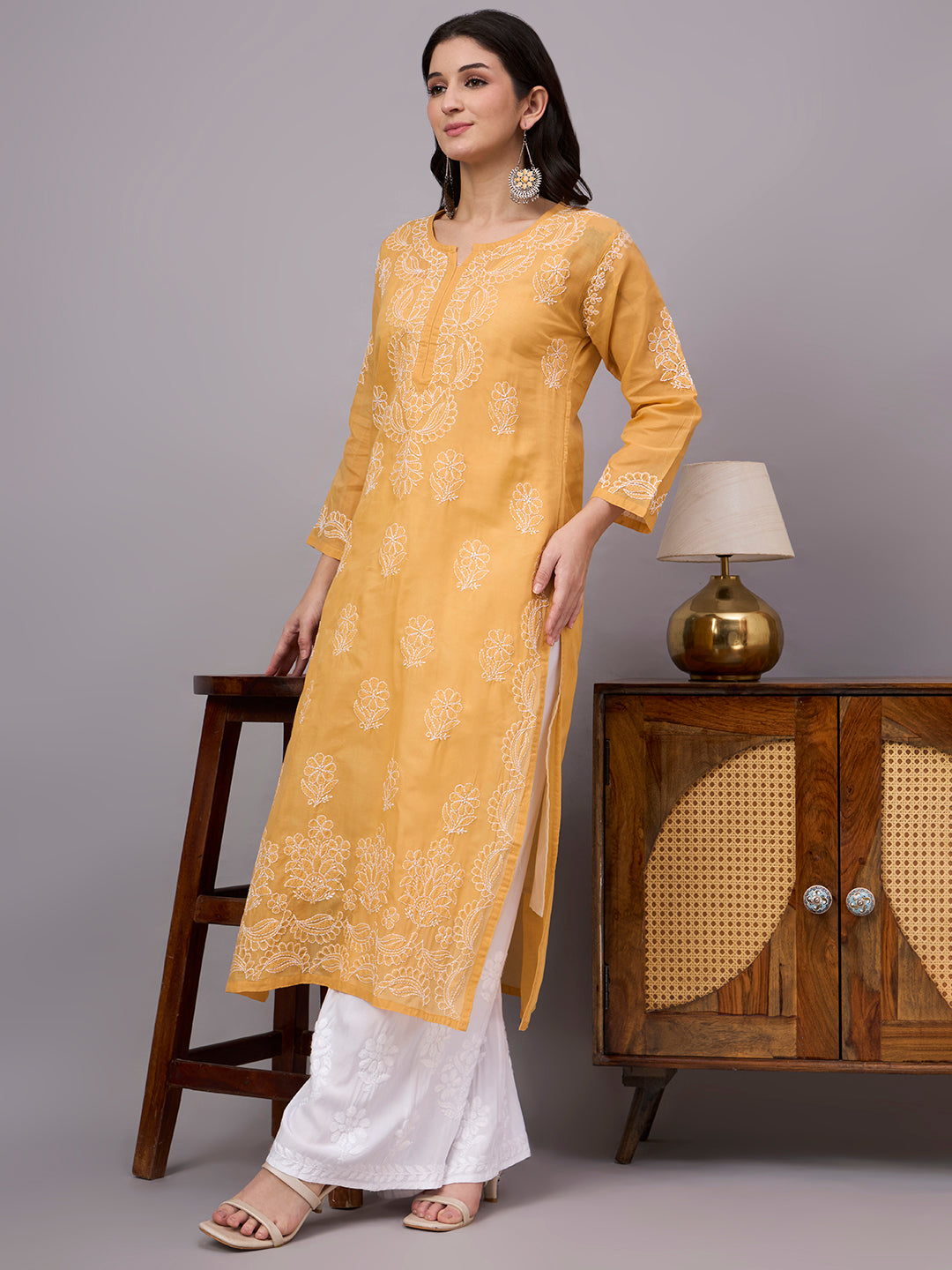 Comfortable regular wear Chikankari Kurta made from premium cotton fabric with handcrafted embroidery and an attached inner for enhanced comfort and coverage.
