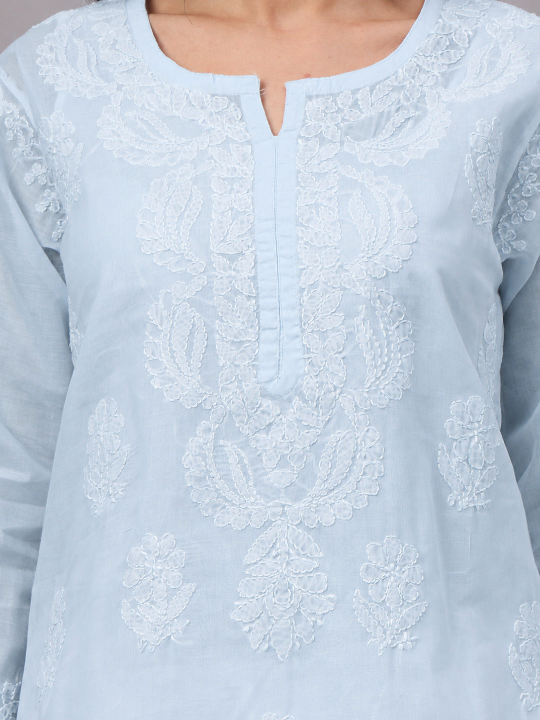 Elegant comfortable regular wear kurti with premium cotton fabric, handcrafted Chikankari embroidery, attached inner, and a straight-cut silhouette for daily fashion.