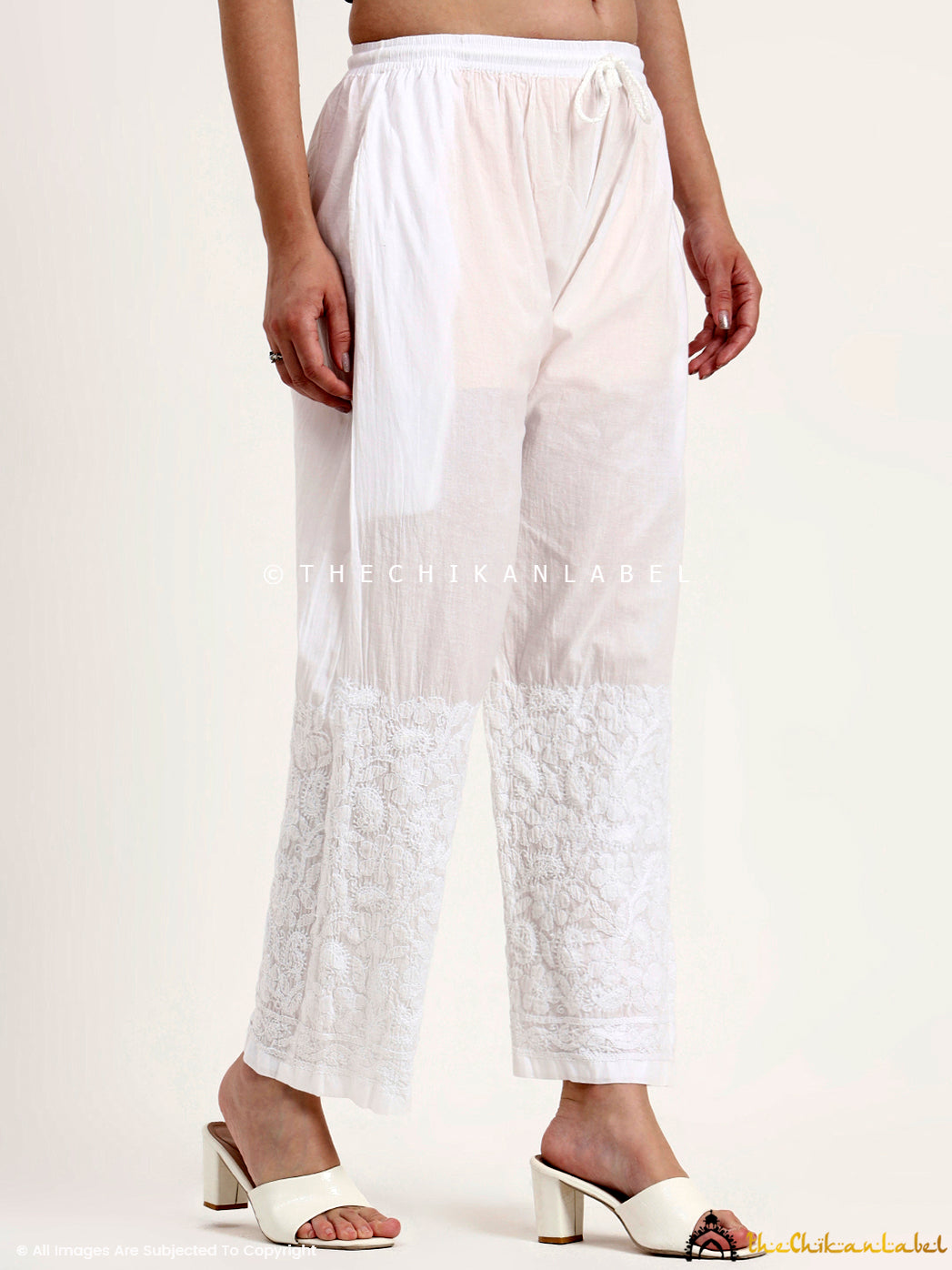 Lightweight cotton palazzo with chikankari hand embroidery, perfect for pairing with kurtis and tunics.