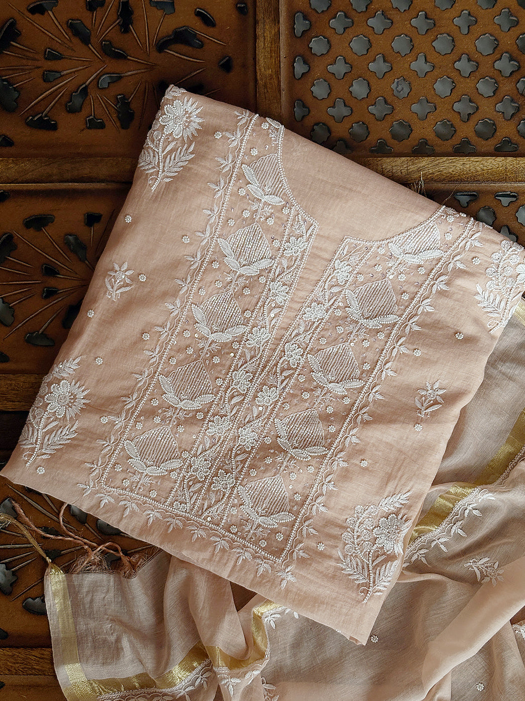 Premium chikankari kurti piece with delicate embroidery in Mul Chanderi paired with matching dupatta.