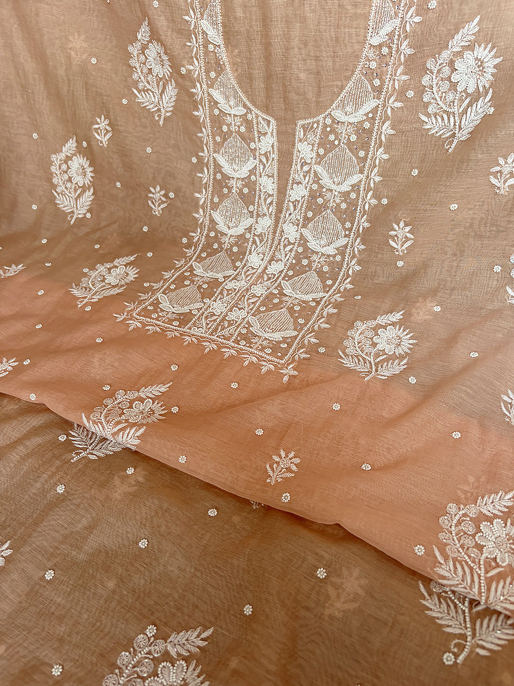 Ethnic wear Mul Chanderi kurti piece unstitched set featuring traditional chikankari designs and dupatta.