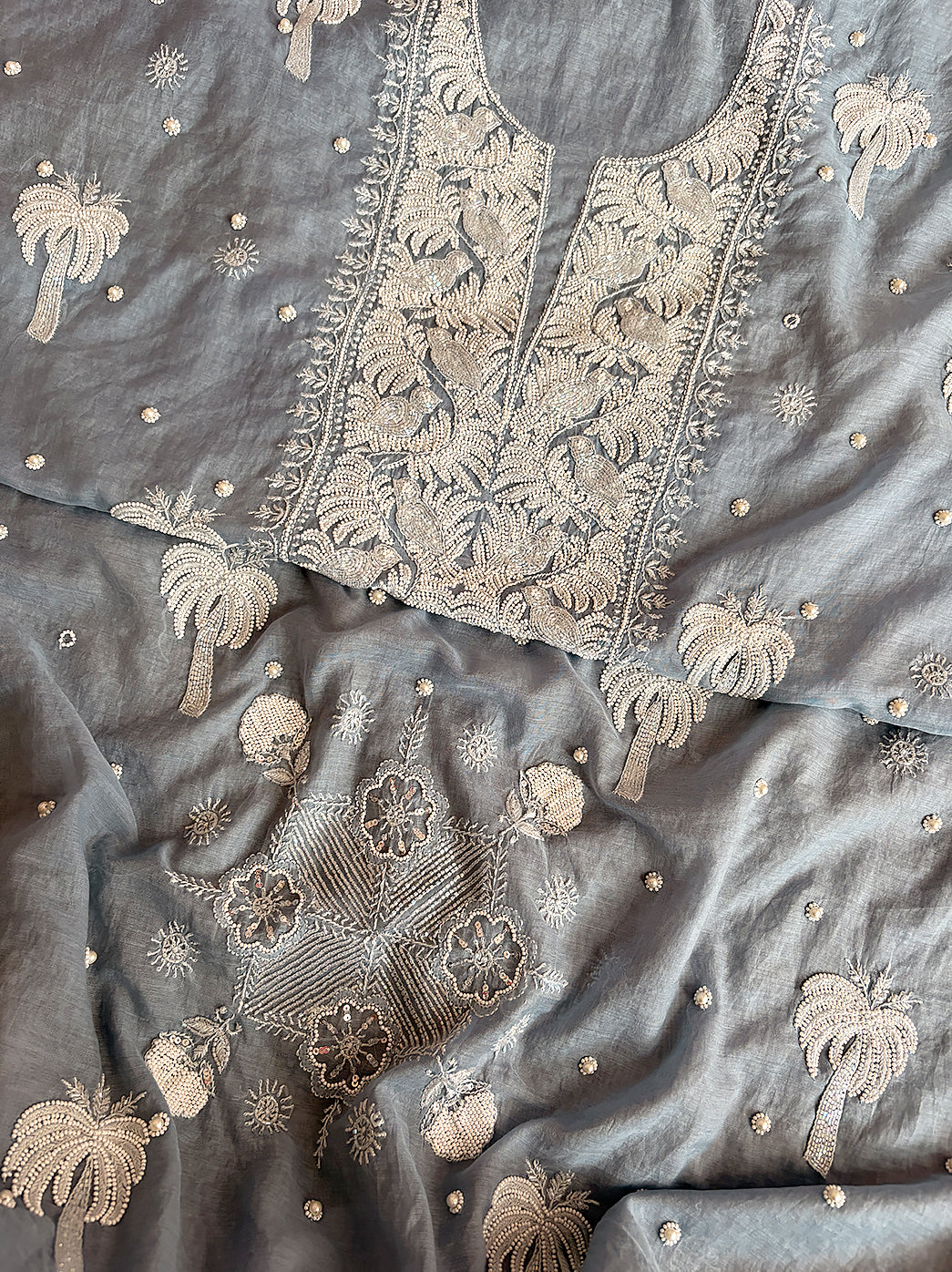 Premium Mul Chanderi kurti fabric unstitched with hand-embroidered chikankari motifs and dupatta.